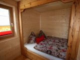 Gemütliche Kuschelecke - Schlafzimmer aus Holz