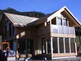 Almdorf aus Holz und Glas