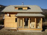 Holzhaus mit Wintergarten