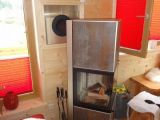 Holzhaus mit Kamin